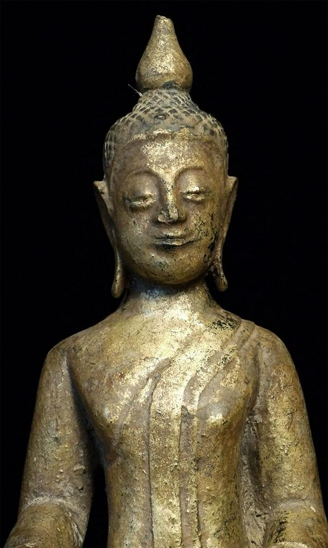Antique Northern Thai Buddha. Inscription on the front: Antique Northern Thai Buddha. Inscription on the front of the base. Sits 9.75 inches tall.