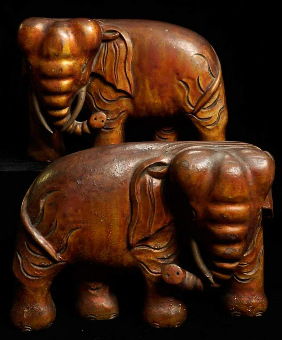 Great pair of Chinese elephants. Possibly altar: Great pair of Chinese elephants. Possibly altar pieces. They look like bookends, but they will not hold books very well, as they are light weight and flop over when trying to hold books. Covered with