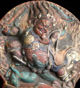 Tibet/Mongolia Buddhist Tsa Tsa/ Tablet with Protective Deity- Nice Quality!: This is a powerful example of its type, with an incredibly intense face. The painting is detailed, although there is some degrading in spots. This style is usually referred to as Tibetan, although