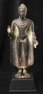 A Thai bronze standing figure of Buddha in 8th/9th century style.: A Thai bronze standing figure of Buddha in 8th/9th century style. Crude repairs at the ankles. Looks to be 20th century. Well sculpted and finished. 10.75"H x 4.25"W - 3lbs / 1.355kg