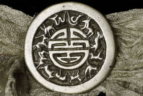 Antique Mongolian Shaman's mirror.: Antique Mongolian Shaman's mirror. 1 7/8" diameter, length of attached cloth -- from medallion edge to end of fabric, is 26".