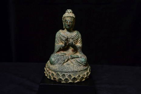 2nd Century or later Bronze Buddha-Himalayan-Earliest of Buddhas- Provenance: This piece, as per the catalog of the exhibition, was formerly displayed at Tibet House in New York City as c.2nd century A.D. as a bronze Uddiyana Buddha (early central Asian) modeled in the round se