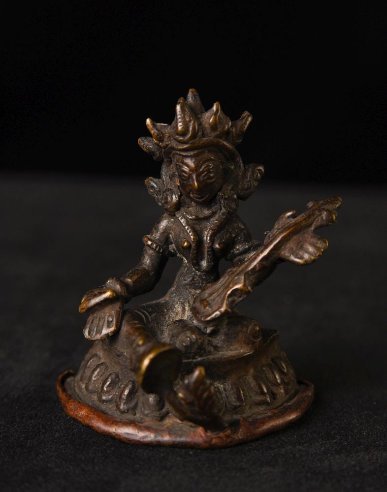 Antique Bronze Nepalese Buddhist Musician. The base is still consecrated. Rare diminutive size. (1 of 10)