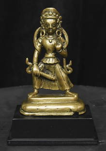11/12thC or Earlier Himalayan Buddhist Bronze Figure.: Very early Himalayan Buddhist Bronze Figure holding a club or other implement. Based on other early Himalayan Bronzes I have seen, I'd date it to 11/12thC and possibly a few centuries earlier. I have