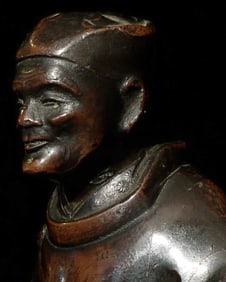 Japanese? Chinese? 19C or earlier solid-cast lead/bronze figure with reddish applied patina.