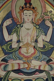 Painted thangka is 10" x 14, overall size is 25" x 16"