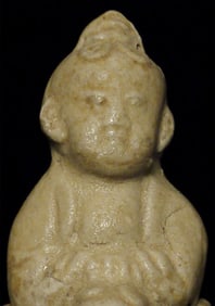 Chinese Monk w/ White Glaze Sitting On Dragon