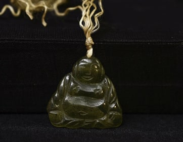 Good Luck Jade Buddha- Not my usual sort of piece so I can't tell you much about it.