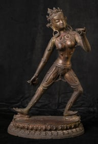 Antique Tibet/Nepal, Bronze Dakini in Lively Attitude.