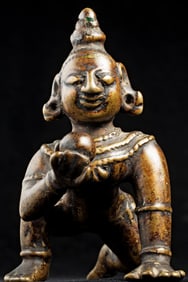 18/19thC bronze baby Krishna with a very sweet face.