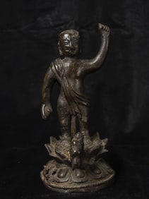 15/16thC Ming Baby Buddha pointing toward heaven and earth. Dragon base