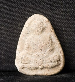 This is a Thai amulet from an extensive collection of Thai and other Southeast Asian Buddhist