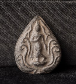 This is a Thai amulet from an extensive collection of Thai and other Southeast Asian Buddhist