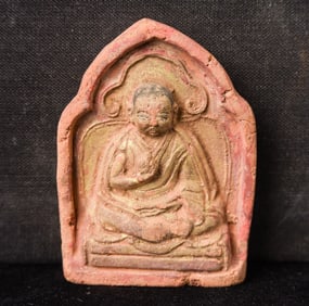 Antique Tibetan or Mongolian Tsa Tsa of a monk or teacher.