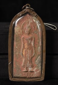 Large ancient Thai silver/lead amulet in a modern amulet case.