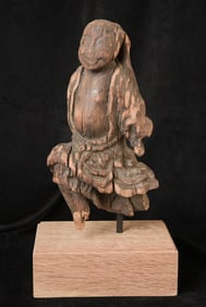 Early Japanese wooden Figure Deity or other magical character in flow.