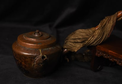 Mongolian ceremonial copper teapot with original wood handle (loose). A very decorative example. (