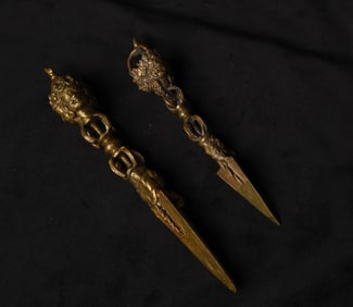 Pair of elaborate bronze (or other metal alloys) antique Mongolian Phurbas. Animated!