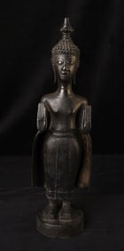 Vintage/Old Laos standing bronze Buddha in the "calming the waters"