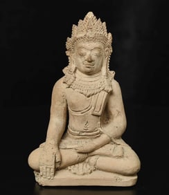 This is a 10/11thC "Haripunchai" style terracotta Buddha.