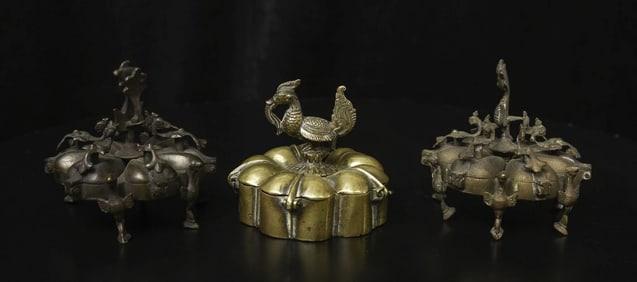 Three antique Indian bronze containers, each about 3" high, diameters of 3-1/8". Some losses as seen