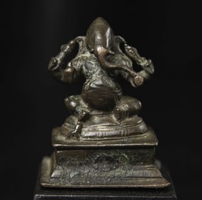 Classic 18-19thC near miniature Indian bronze four-arm Ganesh.