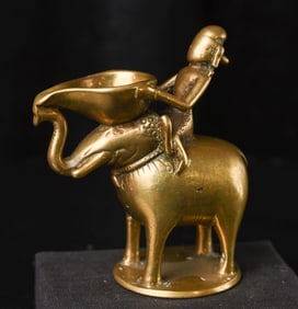 Indian Oil Lamp as elephant and rider.