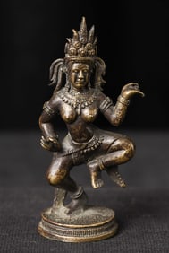Thai or Cambodian miniature bronze dancer.