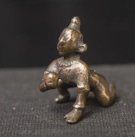 Early Miniature Indian Bronze Baby Krishna with his Butterball.