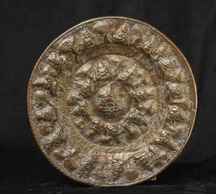 Older Hindu plaque of repousse brass --10.75" in