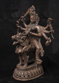 A very good antique bodhisattva on top of a Lion Dog.