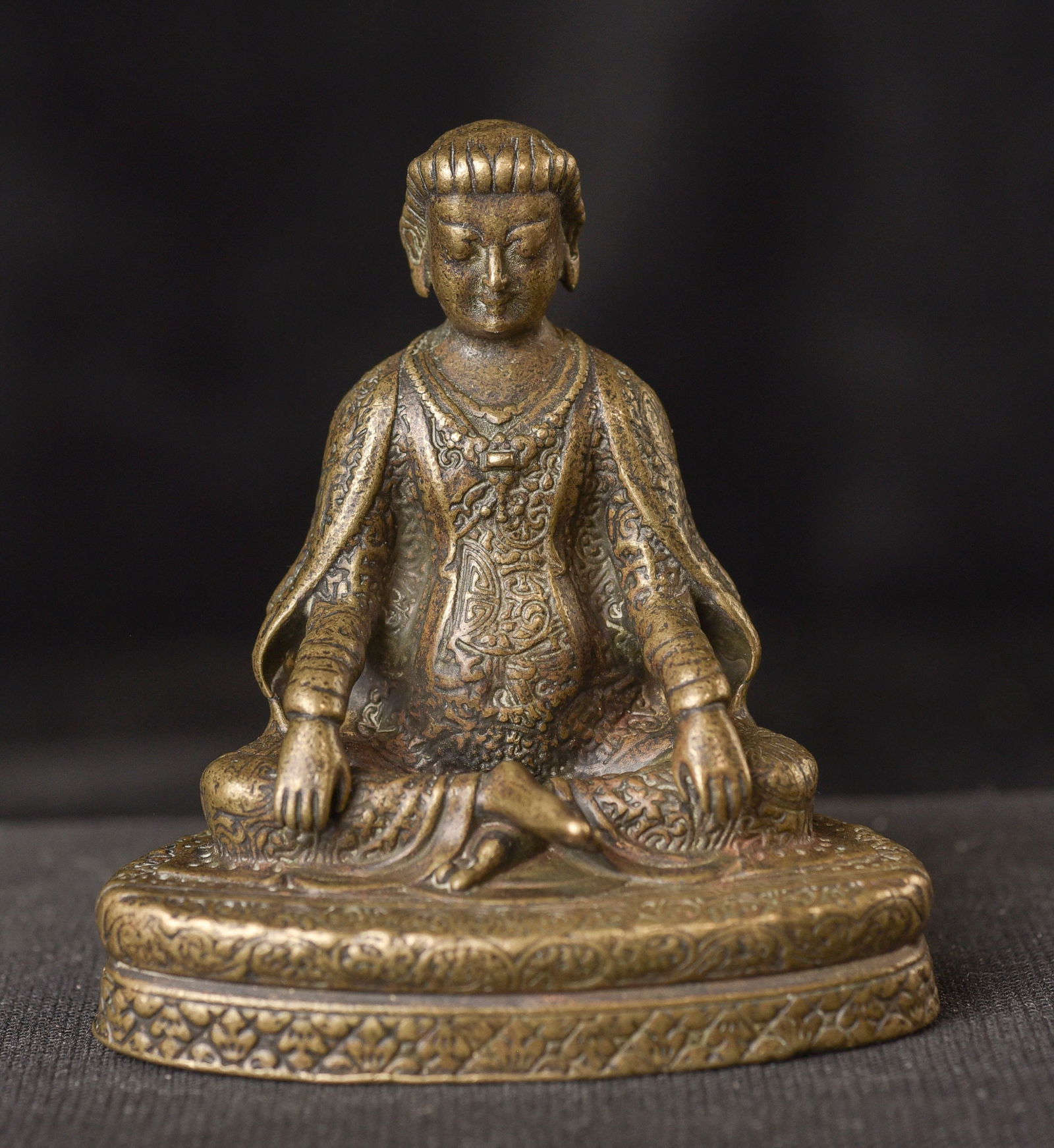 Fine, Small Nepalese Monk or Teacher. Very detailed designs cover the entire body/robes. (1 of 10)