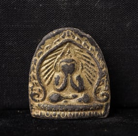 This is a Thai amulet from an extensive collection of Thai and other Southeast Asian Buddhist
