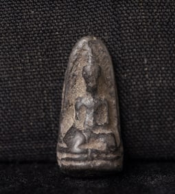 This is a Thai amulet from an extensive collection of Thai and other Southeast Asian Buddhist