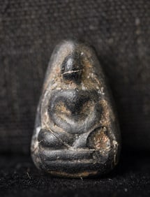 This is a Thai amulet from an extensive collection of Thai and other Southeast Asian Buddhist