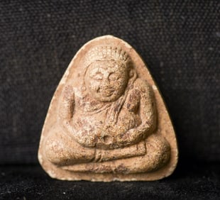 This is a Thai amulet from an extensive collection of Thai and other Southeast Asian Buddhist