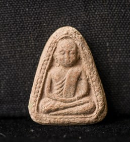 This is a Thai amulet from an extensive collection of Thai and other Southeast Asian Buddhist