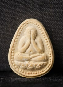 This is a Thai amulet from an extensive collection of Thai and other Southeast Asian Buddhist