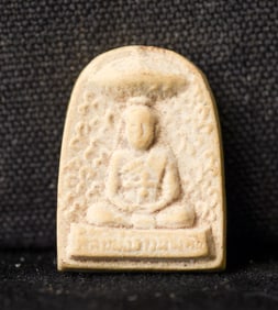 This is a Thai amulet from an extensive collection of Thai and other Southeast Asian Buddhist
