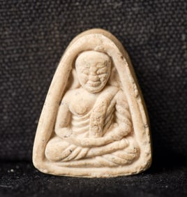 This is a Thai amulet from an extensive collection of Thai and other Southeast Asian Buddhist