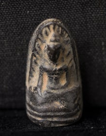 This is a Thai amulet from an extensive collection of Thai and other Southeast Asian Buddhist