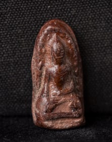 This is a Thai amulet from an extensive collection of Thai and other Southeast Asian Buddhist