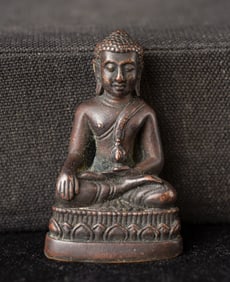 This is a Thai amulet from an extensive collection of Thai and other Southeast Asian Buddhist