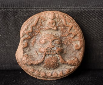 This is a Thai amulet from an extensive collection of Thai and other Southeast Asian Buddhist