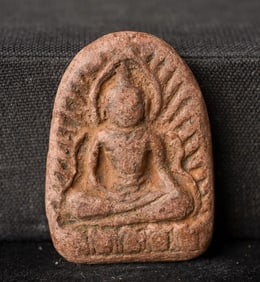 This is a Thai amulet from an extensive collection of Thai and other Southeast Asian Buddhist