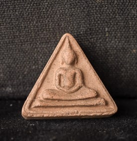 This is a Thai amulet from an extensive collection of Thai and other Southeast Asian Buddhist