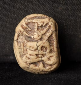 This is a Thai amulet from an extensive collection of Thai and other Southeast Asian Buddhist