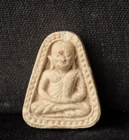 This is a Thai amulet from an extensive collection of Thai and other Southeast Asian Buddhist