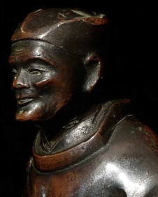 Japanese? Chinese? 19C or earlier solid-cast lead/bronze figure with reddish applied patina.