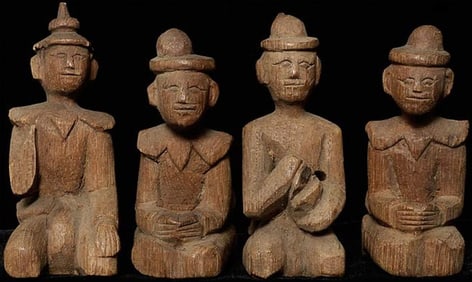 Set of 14 antique wooden Burmese Monks figures plus a shield.